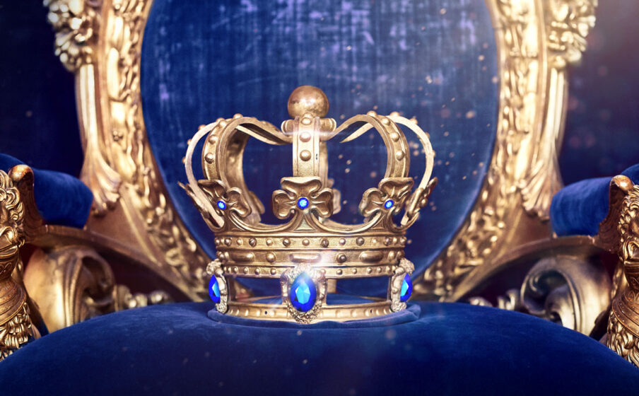 Crown with sapphires on blue velvet chair